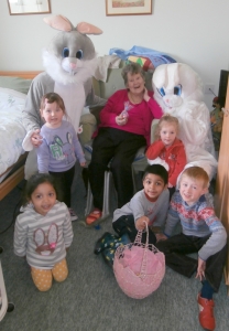 Yvonne enjoys her time with the bunnies & Children