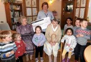 Jan receives the cheque for Marie Curie