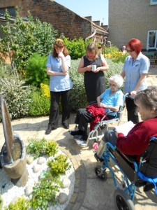 Everyone looks at the Memorial Garden