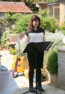 Christina reads a poem at the memorial service