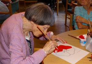 Tilly painting the poppies