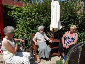 Joan and her friends in the garden