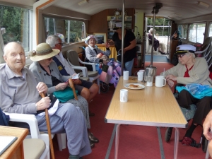 Enjoying afternoon tea on board the Waveney Stardust