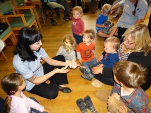 Lauren shows the children one of the snakes
