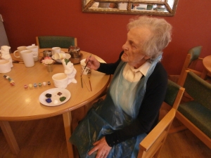 Jean painting her gnome
