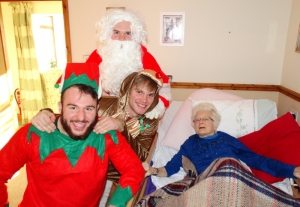Margaret gets a visit from Santa and his helpers